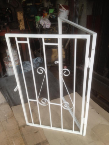 Security bar for window which can open to clean windows Sparkbrook Birmingham 2010